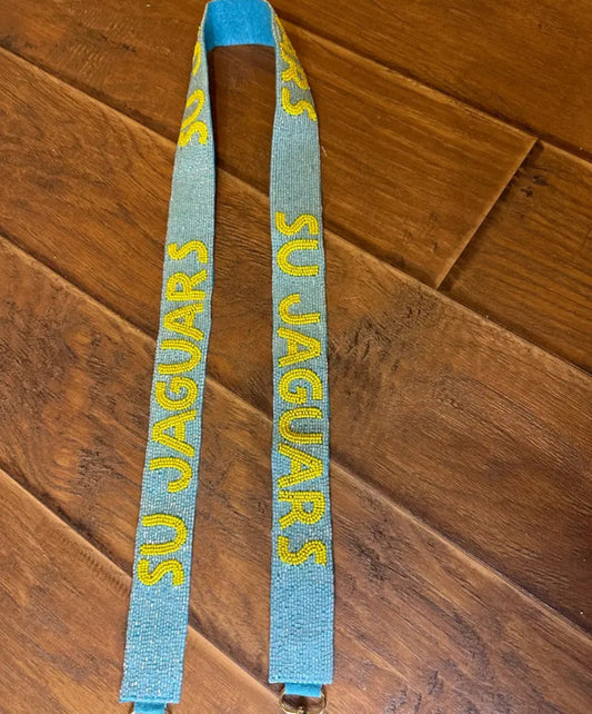 SU purse strap